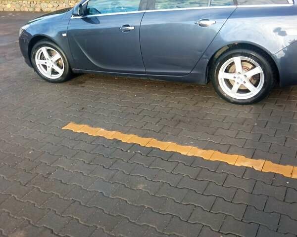 Синий Опель Инсигния, объемом двигателя 2 л и пробегом 238 тыс. км за 8800 $, фото 3 на Automoto.ua