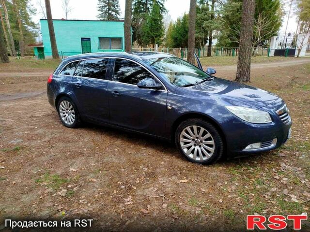Синий Опель Инсигния, объемом двигателя 2 л и пробегом 303 тыс. км за 7700 $, фото 5 на Automoto.ua