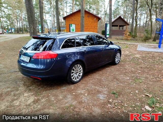 Синий Опель Инсигния, объемом двигателя 2 л и пробегом 303 тыс. км за 7700 $, фото 4 на Automoto.ua