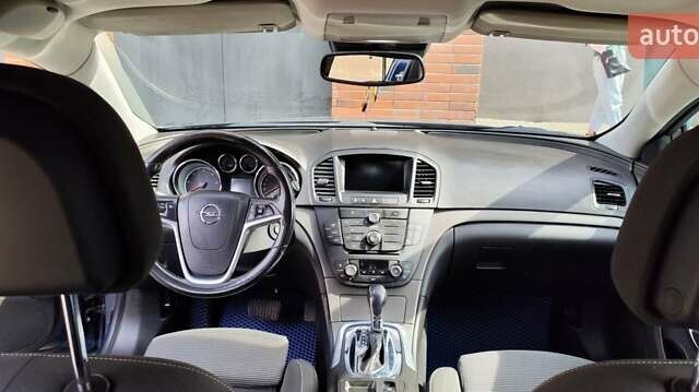 Синий Опель Инсигния, объемом двигателя 1.96 л и пробегом 213 тыс. км за 8500 $, фото 10 на Automoto.ua