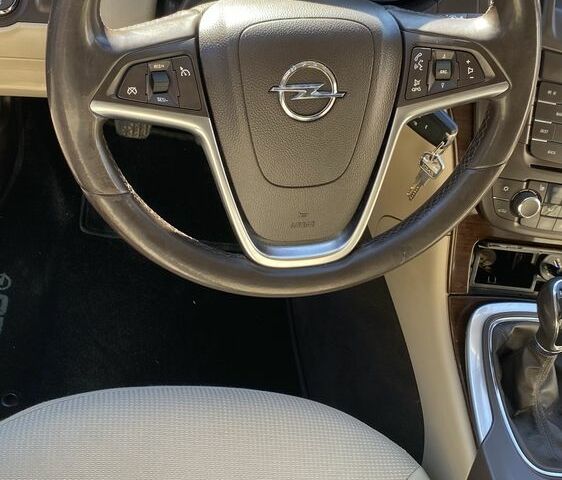 Синий Опель Инсигния, объемом двигателя 2 л и пробегом 345 тыс. км за 7500 $, фото 7 на Automoto.ua