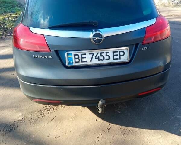 Синий Опель Инсигния, объемом двигателя 2 л и пробегом 238 тыс. км за 8800 $, фото 1 на Automoto.ua