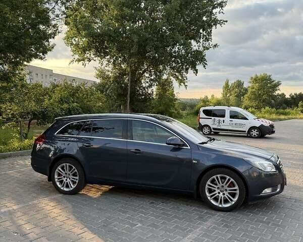 Синий Опель Инсигния, объемом двигателя 2 л и пробегом 340 тыс. км за 8000 $, фото 4 на Automoto.ua