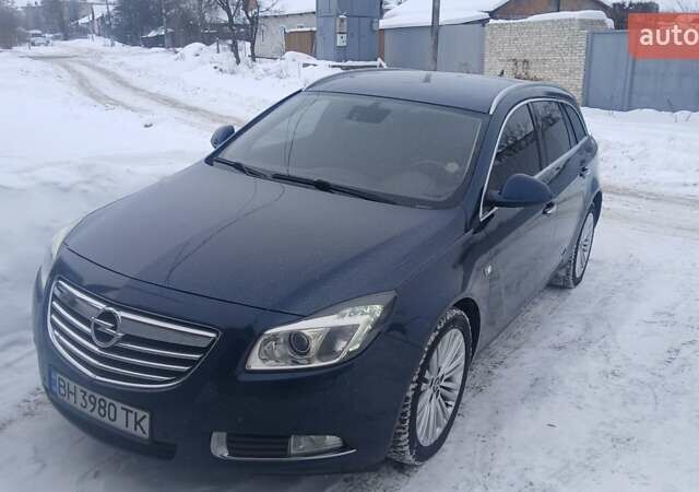 Синий Опель Инсигния, объемом двигателя 1.96 л и пробегом 320 тыс. км за 7600 $, фото 1 на Automoto.ua