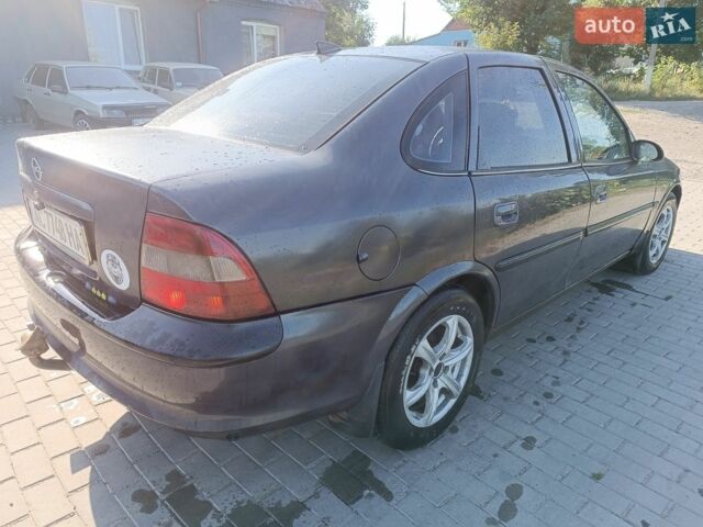 Синий Опель Инсигния, объемом двигателя 2 л и пробегом 257 тыс. км за 7613 $, фото 5 на Automoto.ua