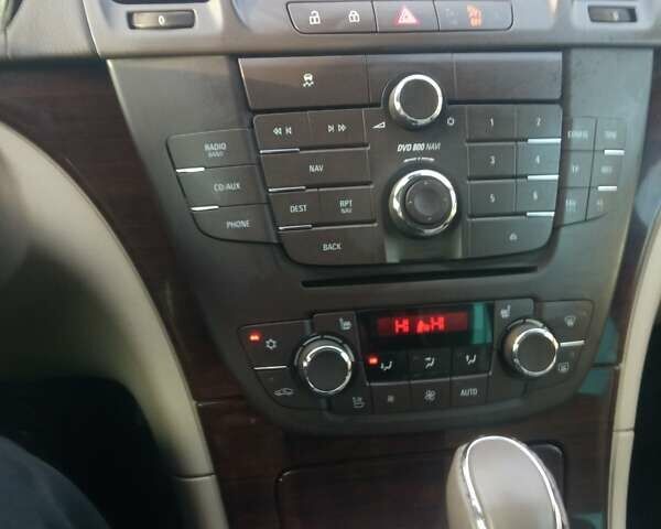 Синий Опель Инсигния, объемом двигателя 2 л и пробегом 238 тыс. км за 8800 $, фото 2 на Automoto.ua