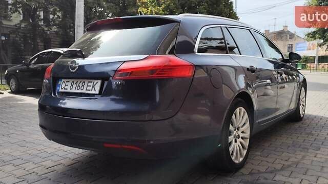 Синий Опель Инсигния, объемом двигателя 1.96 л и пробегом 213 тыс. км за 8500 $, фото 6 на Automoto.ua