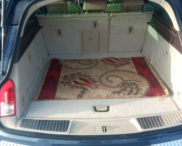 Синий Опель Инсигния, объемом двигателя 2 л и пробегом 238 тыс. км за 8800 $, фото 4 на Automoto.ua