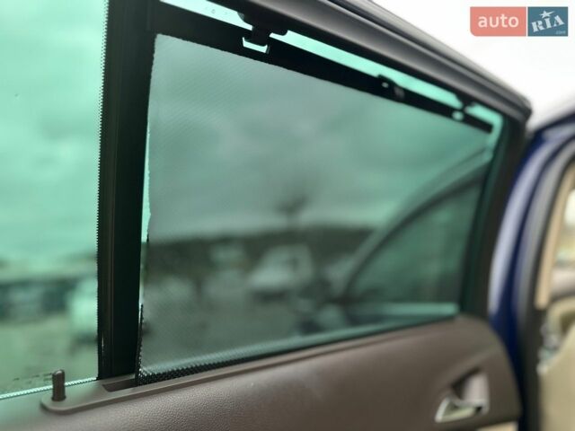 Синий Опель Инсигния, объемом двигателя 2 л и пробегом 266 тыс. км за 7900 $, фото 24 на Automoto.ua