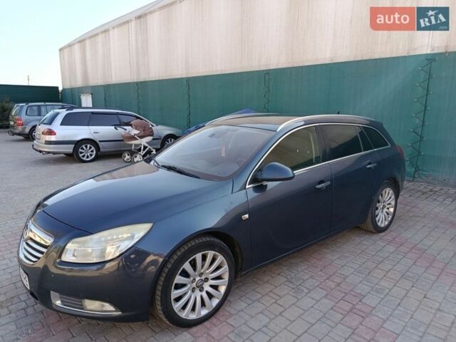 Синий Опель Инсигния, объемом двигателя 2 л и пробегом 230 тыс. км за 6400 $, фото 2 на Automoto.ua