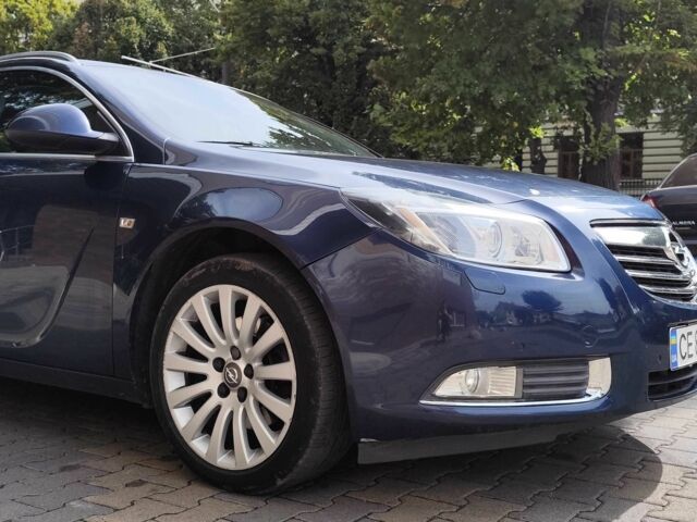 Синий Опель Инсигния, объемом двигателя 2 л и пробегом 212 тыс. км за 8500 $, фото 7 на Automoto.ua
