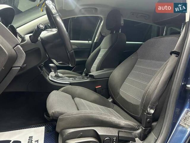 Синий Опель Инсигния, объемом двигателя 2 л и пробегом 211 тыс. км за 8800 $, фото 6 на Automoto.ua