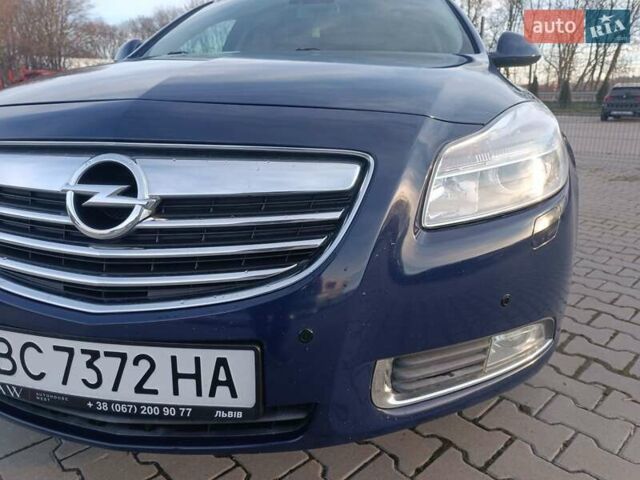 Синий Опель Инсигния, объемом двигателя 1.96 л и пробегом 259 тыс. км за 7850 $, фото 13 на Automoto.ua