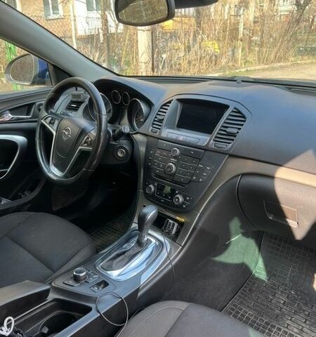 Синий Опель Инсигния, объемом двигателя 1.96 л и пробегом 235 тыс. км за 7300 $, фото 1 на Automoto.ua