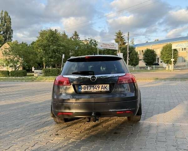 Синий Опель Инсигния, объемом двигателя 2 л и пробегом 340 тыс. км за 8000 $, фото 2 на Automoto.ua