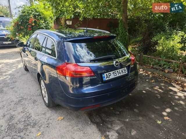 Синий Опель Инсигния, объемом двигателя 1.96 л и пробегом 224 тыс. км за 11500 $, фото 21 на Automoto.ua