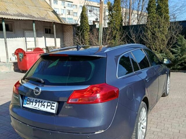 Синий Опель Инсигния, объемом двигателя 2 л и пробегом 230 тыс. км за 7300 $, фото 2 на Automoto.ua