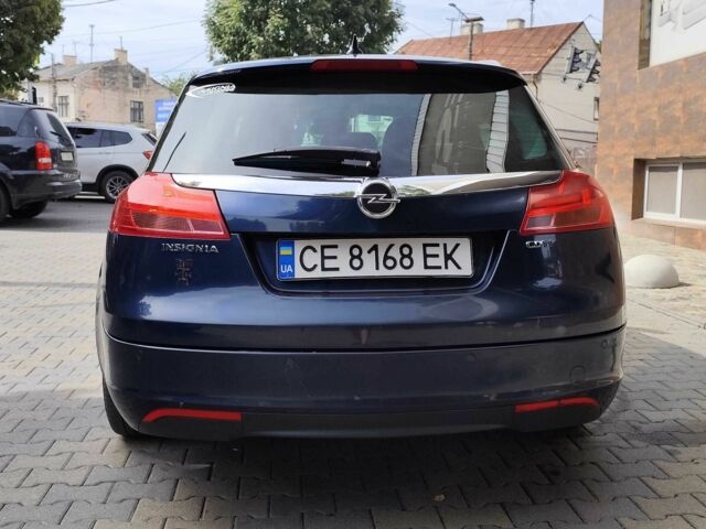 Синий Опель Инсигния, объемом двигателя 2 л и пробегом 212 тыс. км за 8500 $, фото 4 на Automoto.ua