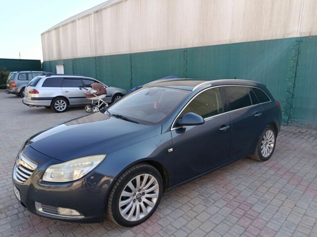 Синий Опель Инсигния, объемом двигателя 2 л и пробегом 230 тыс. км за 7300 $, фото 5 на Automoto.ua