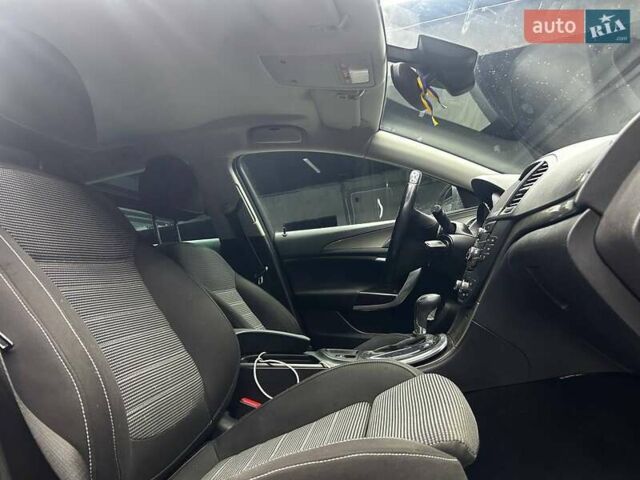 Синий Опель Инсигния, объемом двигателя 2 л и пробегом 211 тыс. км за 8800 $, фото 14 на Automoto.ua
