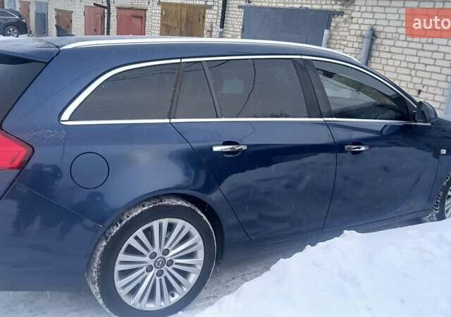 Синий Опель Инсигния, объемом двигателя 1.96 л и пробегом 320 тыс. км за 7600 $, фото 3 на Automoto.ua