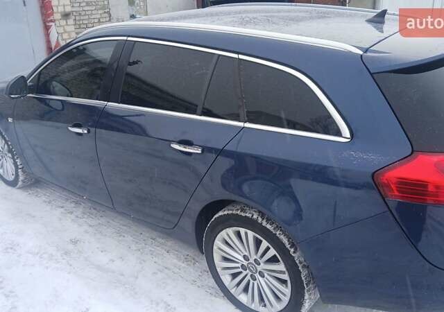 Синий Опель Инсигния, объемом двигателя 1.96 л и пробегом 320 тыс. км за 7600 $, фото 2 на Automoto.ua