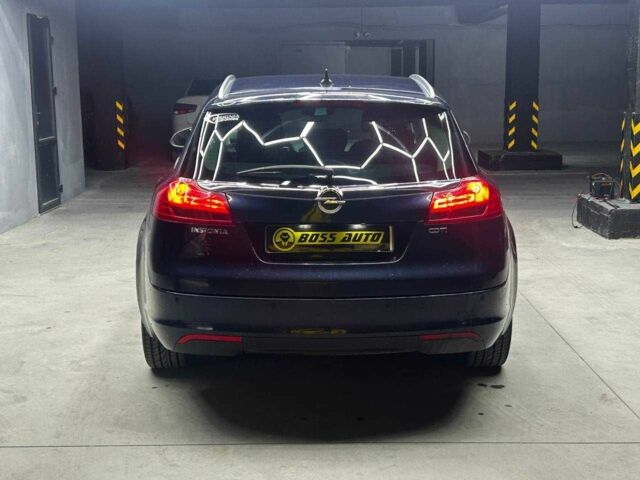 Синий Опель Инсигния, объемом двигателя 2 л и пробегом 211 тыс. км за 8800 $, фото 4 на Automoto.ua