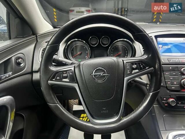 Синий Опель Инсигния, объемом двигателя 2 л и пробегом 211 тыс. км за 8800 $, фото 10 на Automoto.ua