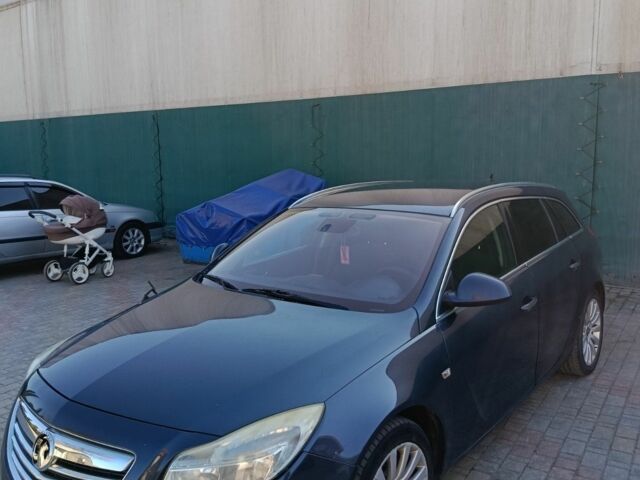 Синий Опель Инсигния, объемом двигателя 2 л и пробегом 230 тыс. км за 7300 $, фото 4 на Automoto.ua