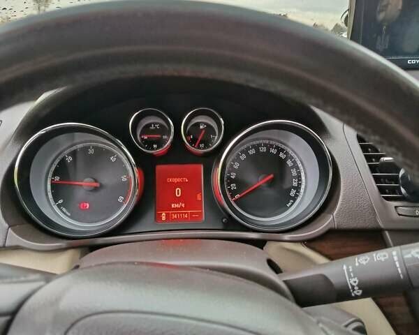 Синий Опель Инсигния, объемом двигателя 2 л и пробегом 341 тыс. км за 6700 $, фото 1 на Automoto.ua