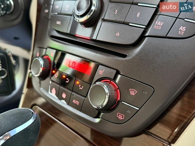 Синій Опель Інсігнія, об'ємом двигуна 2 л та пробігом 241 тис. км за 5999 $, фото 60 на Automoto.ua