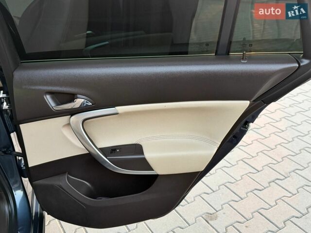 Синій Опель Інсігнія, об'ємом двигуна 2 л та пробігом 241 тис. км за 5999 $, фото 39 на Automoto.ua