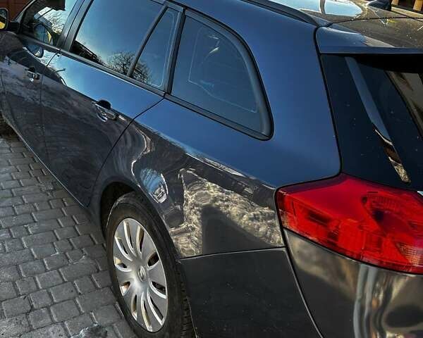 Синій Опель Інсігнія, об'ємом двигуна 1.96 л та пробігом 300 тис. км за 7200 $, фото 4 на Automoto.ua