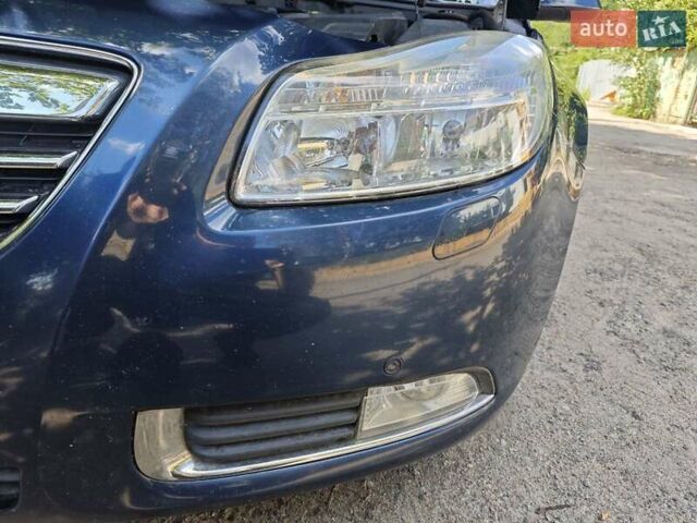 Синий Опель Инсигния, объемом двигателя 1.96 л и пробегом 224 тыс. км за 11500 $, фото 18 на Automoto.ua