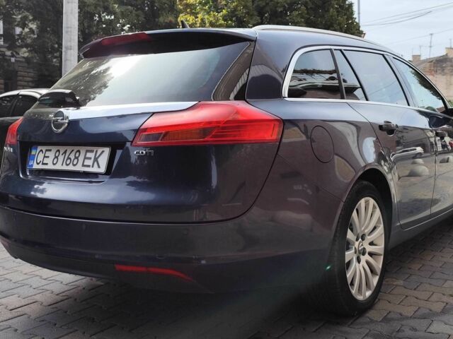 Синий Опель Инсигния, объемом двигателя 2 л и пробегом 212 тыс. км за 8500 $, фото 5 на Automoto.ua