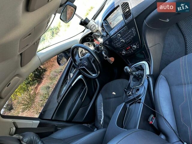 Синий Опель Инсигния, объемом двигателя 1.96 л и пробегом 312 тыс. км за 7500 $, фото 14 на Automoto.ua