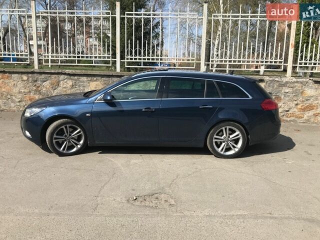 Синий Опель Инсигния, объемом двигателя 2 л и пробегом 236 тыс. км за 14500 $, фото 4 на Automoto.ua
