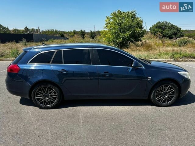 Синий Опель Инсигния, объемом двигателя 1.96 л и пробегом 312 тыс. км за 7500 $, фото 16 на Automoto.ua