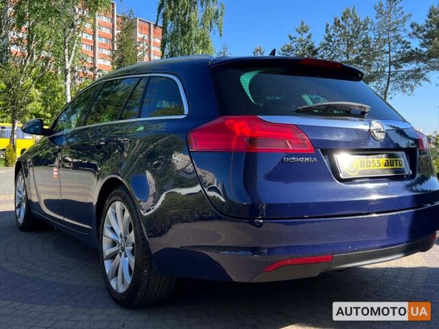 Синий Опель Инсигния, объемом двигателя 2 л и пробегом 260 тыс. км за 8700 $, фото 4 на Automoto.ua