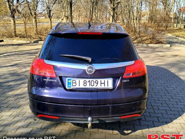 Синий Опель Инсигния, объемом двигателя 2 л и пробегом 257 тыс. км за 8000 $, фото 5 на Automoto.ua