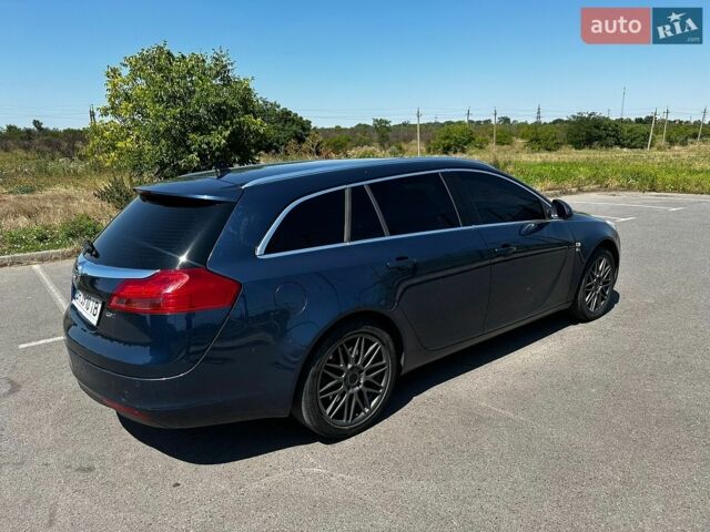 Синий Опель Инсигния, объемом двигателя 1.96 л и пробегом 312 тыс. км за 7500 $, фото 17 на Automoto.ua