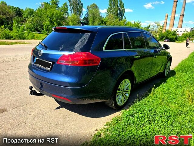 Синий Опель Инсигния, объемом двигателя 2 л и пробегом 183 тыс. км за 7500 $, фото 3 на Automoto.ua