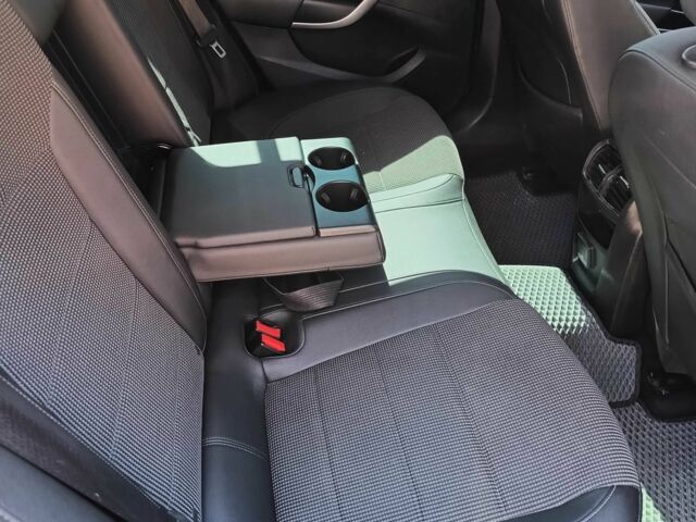 Синий Опель Инсигния, объемом двигателя 2 л и пробегом 201 тыс. км за 9200 $, фото 4 на Automoto.ua