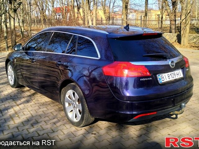Синий Опель Инсигния, объемом двигателя 2 л и пробегом 257 тыс. км за 8000 $, фото 4 на Automoto.ua