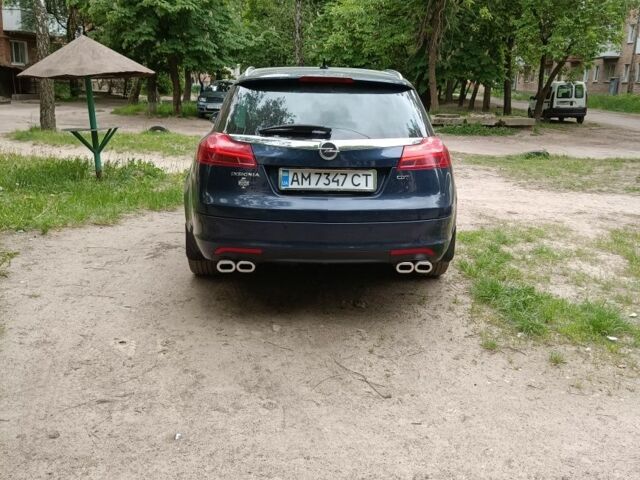 Синий Опель Инсигния, объемом двигателя 2 л и пробегом 218 тыс. км за 8800 $, фото 3 на Automoto.ua