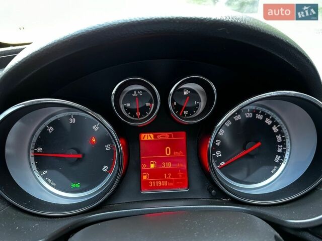 Синій Опель Інсігнія, об'ємом двигуна 1.96 л та пробігом 312 тис. км за 7500 $, фото 8 на Automoto.ua