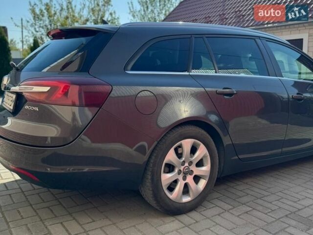 Синій Опель Інсігнія, об'ємом двигуна 1.96 л та пробігом 254 тис. км за 10900 $, фото 4 на Automoto.ua