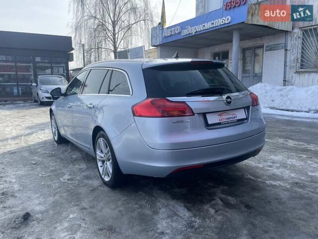 Синій Опель Інсігнія, об'ємом двигуна 1.96 л та пробігом 267 тис. км за 9000 $, фото 4 на Automoto.ua