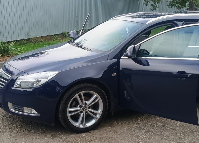 Синий Опель Инсигния, объемом двигателя 2 л и пробегом 220 тыс. км за 8300 $, фото 14 на Automoto.ua