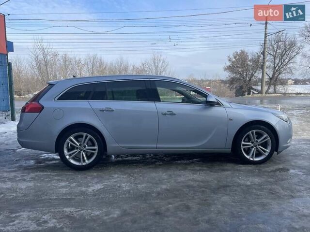 Синій Опель Інсігнія, об'ємом двигуна 1.96 л та пробігом 267 тис. км за 9000 $, фото 1 на Automoto.ua